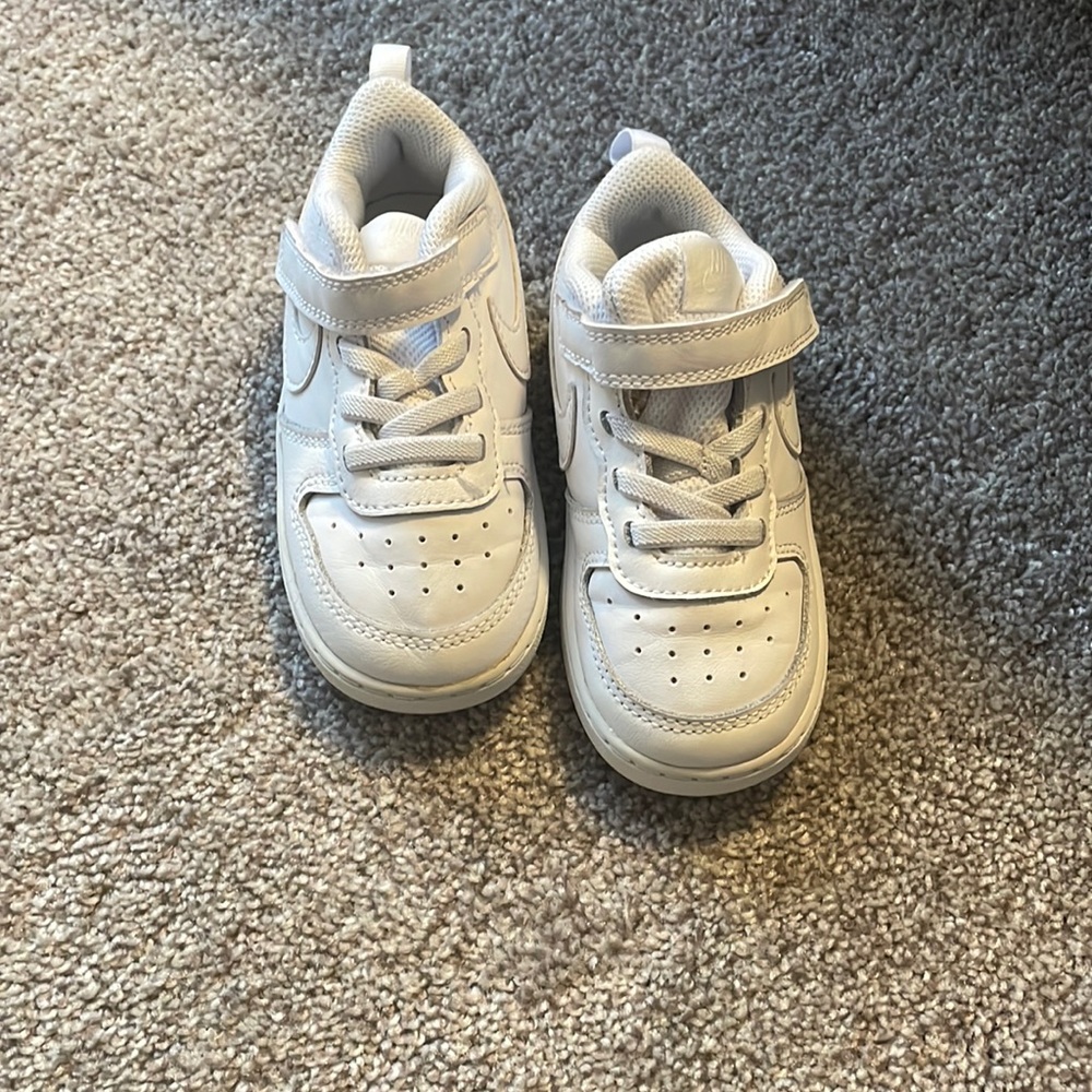 Nike tennis shoes. Toddler size 8. Hardly worn.